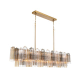Addis 65'' Linear Chandelier in Aged Brass - Front View (ADD-337-AG-AU)