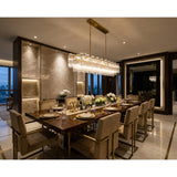 Addis 65'' Linear Chandelier in Aged Brass - Lifestyle View (ADD-337-AG-CL)