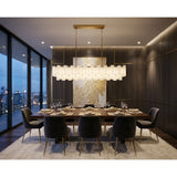 Addis 65'' Linear Chandelier in Aged Brass - Lifestyle View (ADD-337-AG-WH)