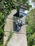 Dumont 14.5'' Outdoor Sconce in Graphite - Lifestyle View (DUM-9804-GE)
